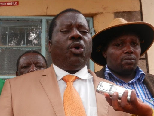 KNUT National chairman Mudzo Nzilli addressing the press outside St Teresa Catholic Chuch KIiamwangi Gatundu South after attending the funeral service of the late Jemima Kioni