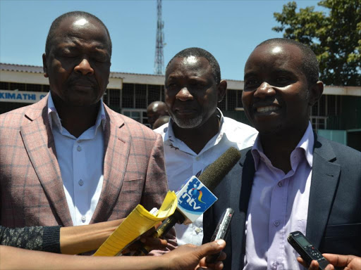 From left Nyeri Senator Mutahi Kagwe, Mathari ward MCA Baragu Mutahi and ICT CS John Mucheru speaking to journalists after attending a church service yesterday at Kimathi PCEA church in Nyeri Central sub -county.