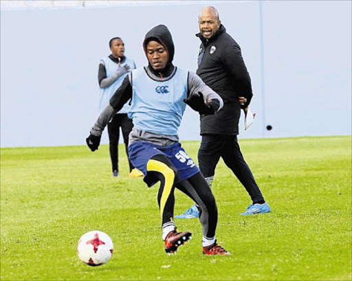 Chippa United coach Tebogo Moloi looks on during his team training session at Sisa Dukashe Stadium in Mdantsane. Picture: SIBONGILE NGALWA