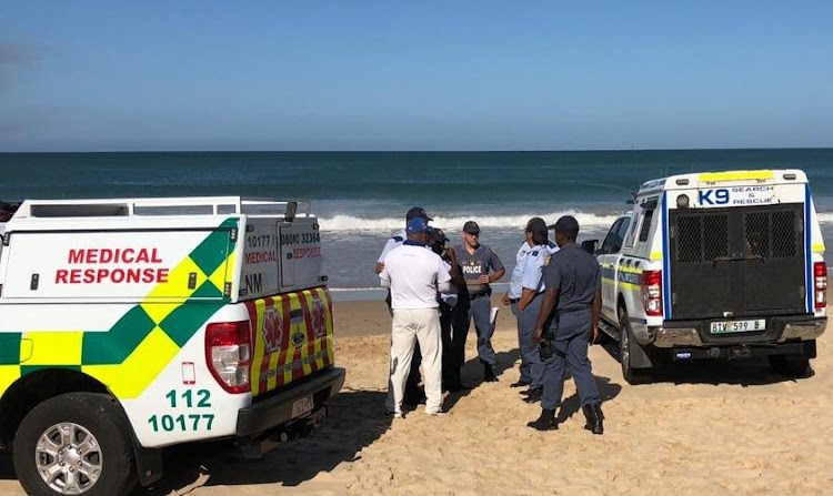 Police at Pollock Beach following a drowning.