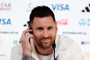 Lionel Messi of Argentina reacts during a match day minus-one press conference at the 2022 World Cup main media centre in Doha, Qatar on November 21 2022.