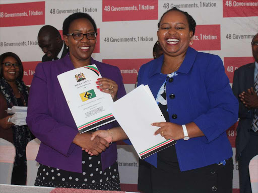 Health CS Sicily Kariuki and Kirinyaga Governor Ann Waiguru during the signing of an MOU on Cuban doctors in Nairobi on 14 May 2018