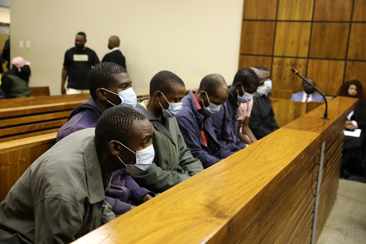 The seven accused in the dock on May 13 2022. The suspects allegedly killed Elvis Nyathi in Diepsloot.