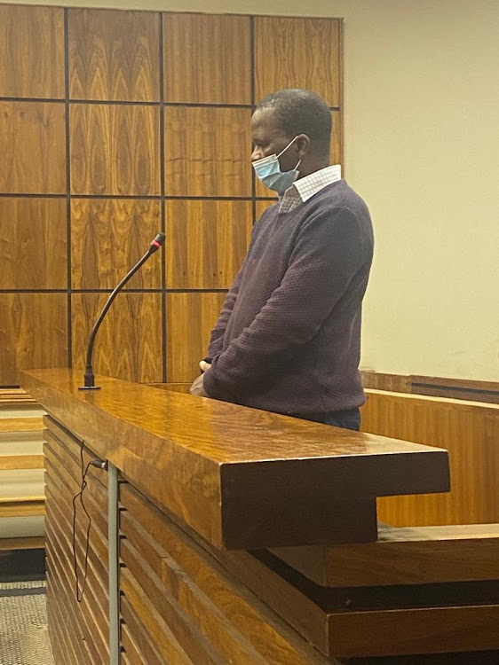 Former deputy director-general of the department of mineral resources Joel Raphela in the Randburg magistrate's court after being discharged from hospital.