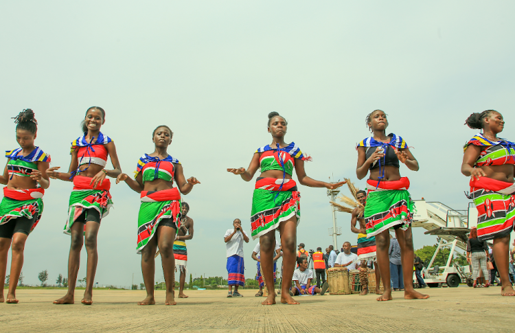 Dancers entertain visitors aboard inaugural Flydubai direct flight on arrival at the Moi International Airport in Mombasa, January 17, 2024.