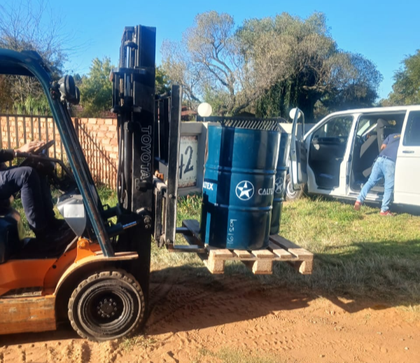 Some of the drums of falsely labelled fuel worth more than R200,000 seized by police.