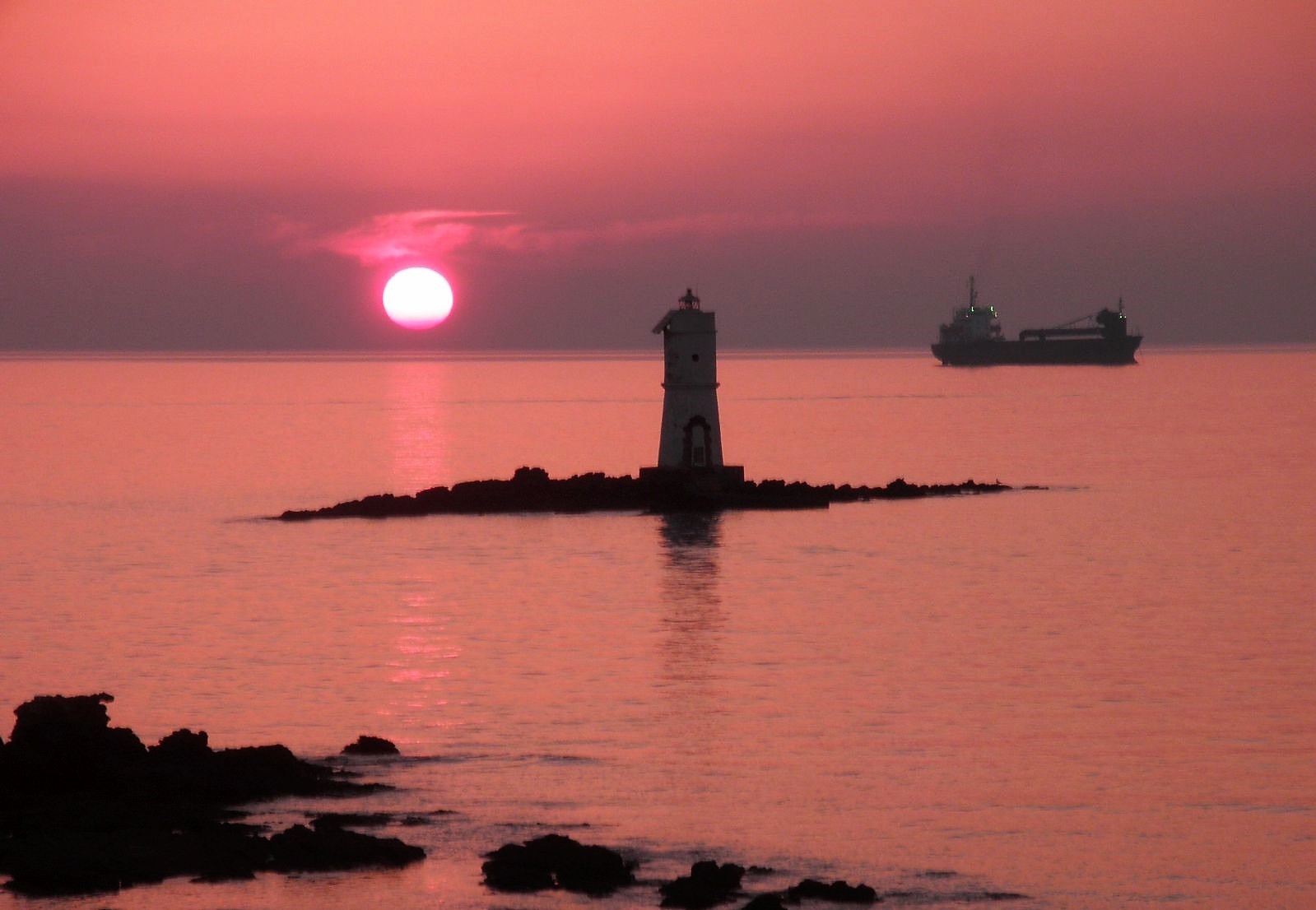 Il faro e la nave di paolo-spagg