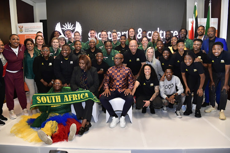 Sport minister Zizi Kodwa with the national women's netball and football teams at a breakfast event on Thursday.