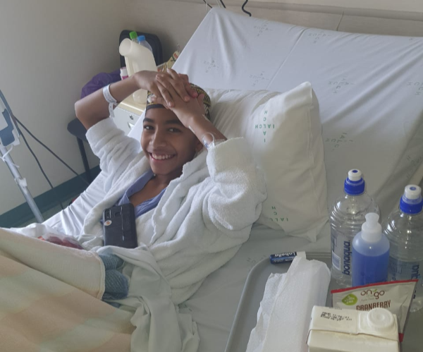 Mohammed Zaeem Khan in hospital, where he spent months undergoing chemotherapy.