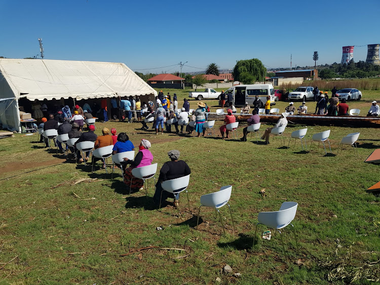 Voters queue at Motsoaledi informal settlement, near Power Park in Soweto.