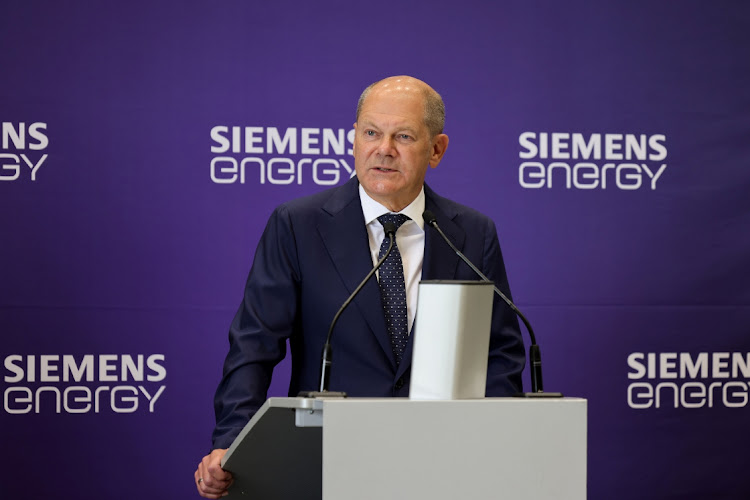 German Chancellor Olaf Scholz at the Siemens gas turbine intended for the Nord Stream 1 gas pipeline in Russia at a Siemens Energy facility on August 03, 2022 in Muelheim an der Ruhr, Germany. Picture: Andreas Rentz/Getty Images