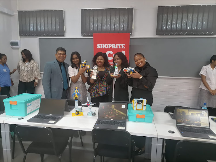 School principal Indran Govender, pupil Saesha Ravisunker, teacher Xoli Mahlangu, pupil Aditi Buddan and the Shoprite Foundation's Maude Modise.