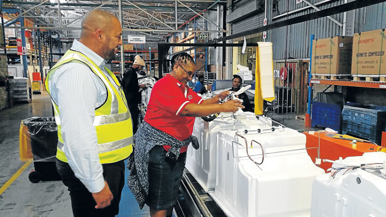 Jared Bishop and Gladys Ntadu. ‘Gladys was meant to retire a year ago, but wants to stay on to see us hit the 90% error-free production figure.’