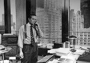 Michael Douglas as Gordon Gekko in director Oliver Stone's 'Wall Street', which was released in 1987. The film tells the story of Bud Fox (Charlie Sheen), a young stockbroker who becomes involved with Gekko, a wealthy, unscrupulous corporate raider.