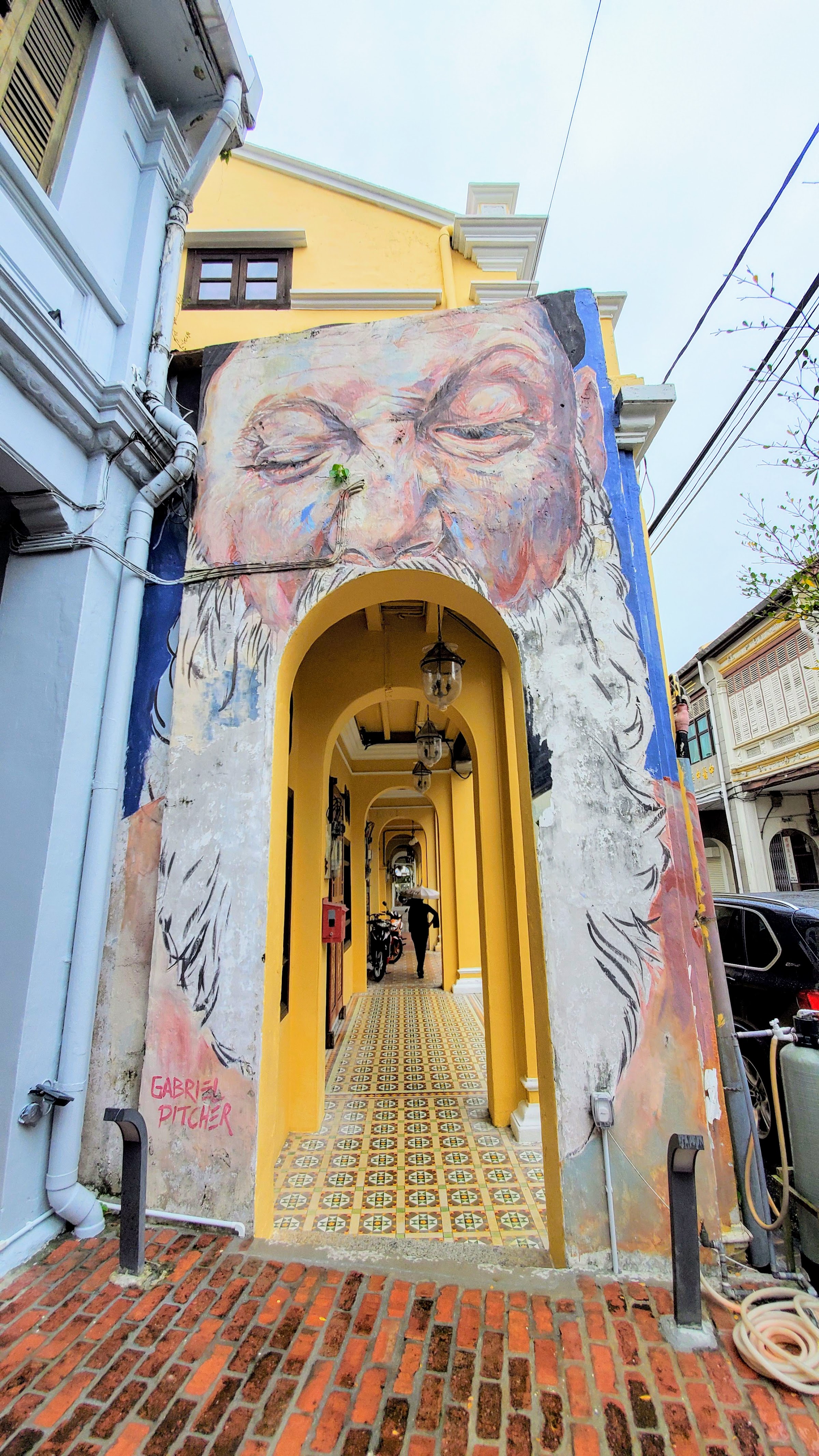 Tips on visiting George Town: sometimes the five foot walkways are clear for walking, sometimes you may have to detour into the street because there are no sidewalks