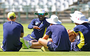 SA senior men's national cricket team head coach Ottis Gibson in a discussion with the players during the Proteas training session .  