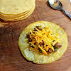 Thumbnail For Ground Beef Mixture And Cheese Added To Tortilla.