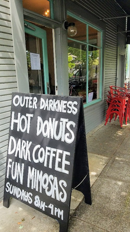 My first look at Outer Darkness Donuts, which on offer here only on Sundays are dark roast drip coffees, fun mimosas, loose leaf tea, and only one food dish you can order: a flight of mini-donuts.