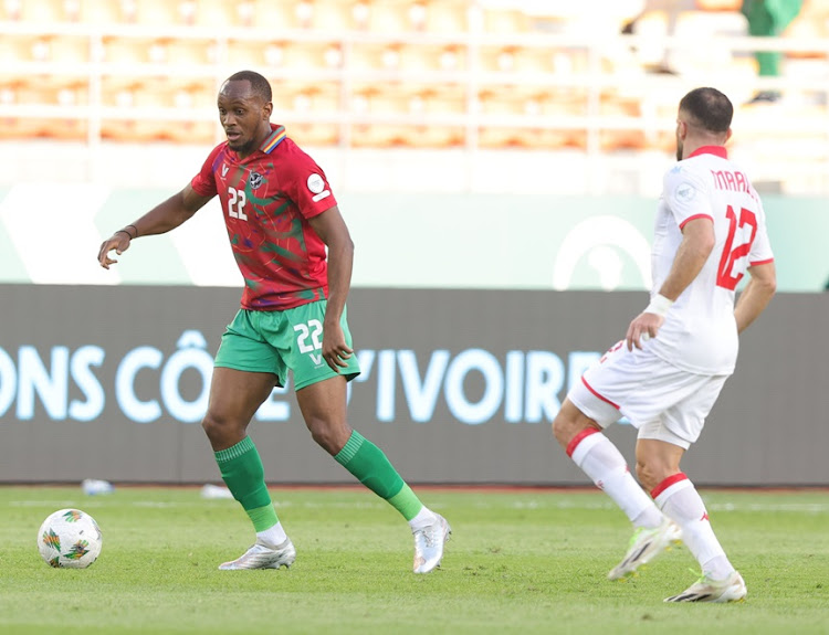 Ryan Nyambe of Namibia is challenged by Ali Maaloul of Tunisia during their 2023 Africa Cup of Nations (Afcon) match against Tunisia at Amadou Gon Coulibaly Stadium in Korhogo.