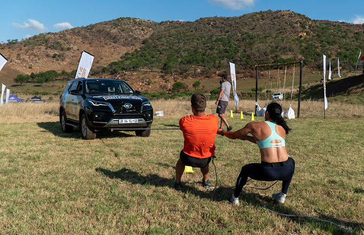 In the final challenge, contestants drag a Toyota Fortuner towards the finish line.