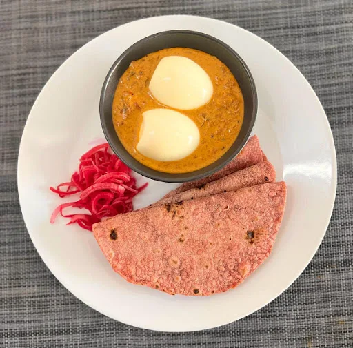 Kadai Egg With Beetroot Chapati And Onion Salad