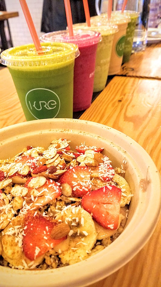 For a healthy option during lunch or brunch at Pine Street Market, Kure Juice Bar offers organic juices, smoothies, tonic shots, hot beverages, oatmeal, and açai bowls