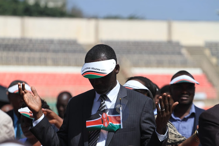 Faithful praying during National Prayer Day at Nyayo National Stadium, Nairobi on Tuesday, February 14, 2023.