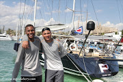 Thami Hoza and Archie Leeu relax in front of a superyacht at one of their stopovers in Spain during last year’s Marine Inspirations programme.