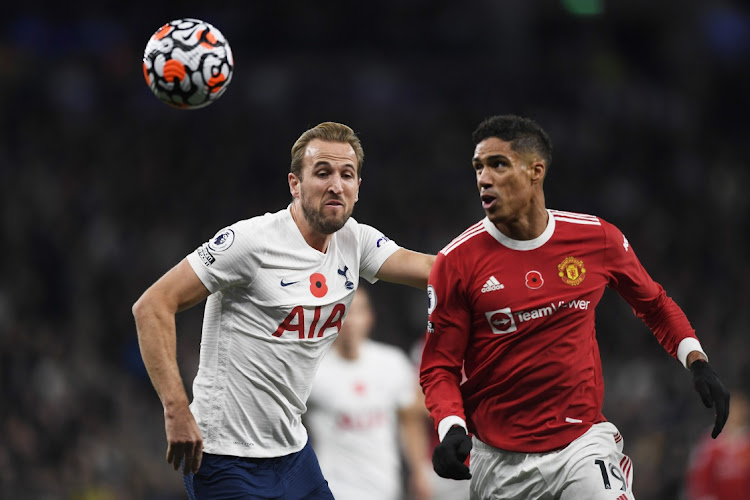 Tottenham Hotspur's Harry Kane in action with Manchester United's Raphael Varane.