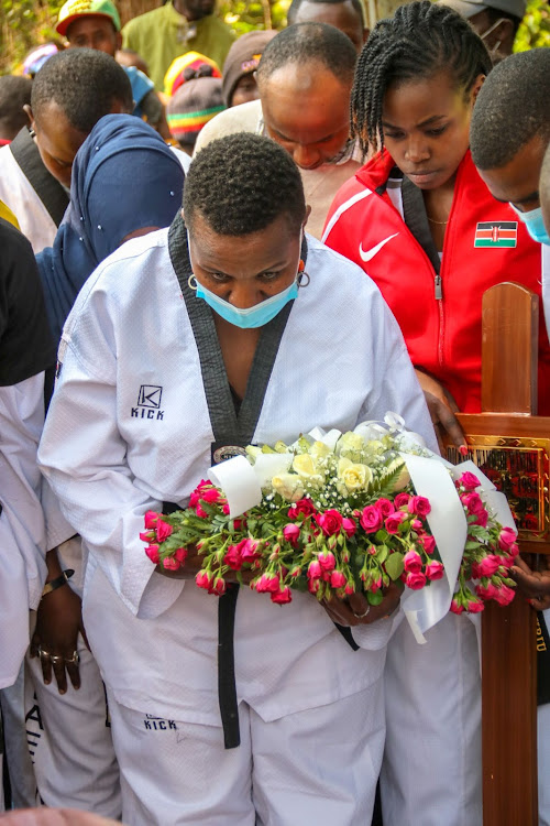 Coach Saida Wambui leads mourners in showing their last respects