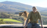 Luke Cornell and one of the cheetah actors on the farm. 
