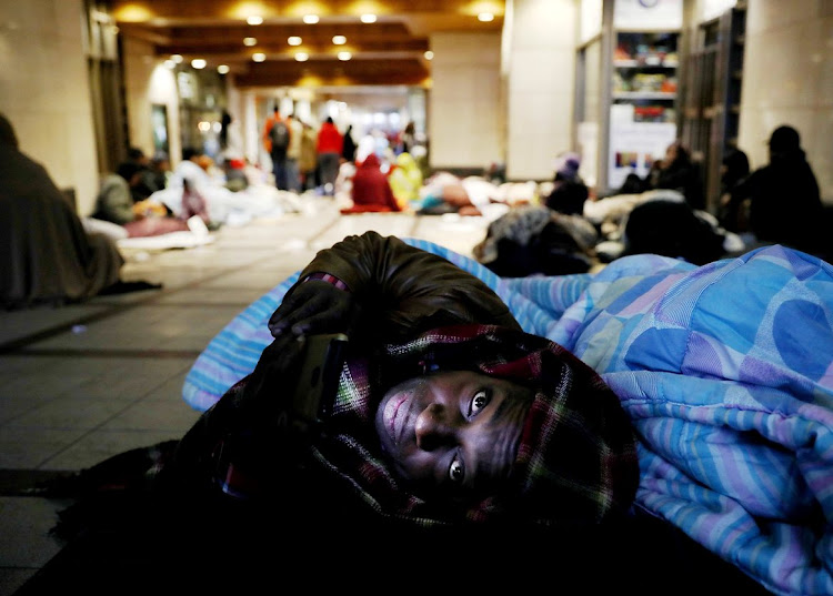 Papy Sukami, from the Democratic Republic of the Congo, is one of the refugees sleeping outside the offices of the UN High Commission for Refugees in Cape Town.