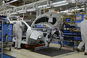 An assembly line at a Nissan auto plant in Dalian, northeastern China. 