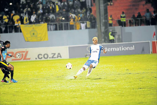 PLAYING SAFE: Chippa United captain, Thamsanqa Sangweni in action against Sundowns at a heavy and muddy Sisa Dukashe Stadium on Tuesday Picture: SINO MAJANGAZA