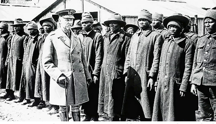 General Jan Smuts inspects an SA native labour unit in France. This scene, thought to have been captured by war photographer John Warwick Brooke, is one of the few images of Black South Africans involved in the war effort