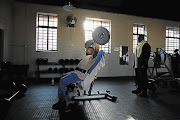 Working out at the Donaldson Orlando Community Centre's gym, in Orlando East, Soweto, where Nelson Mandela used to hone his boxing skills about 60 years ago