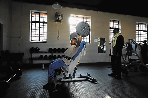 Working out at the Donaldson Orlando Community Centre's gym, in Orlando East, Soweto, where Nelson Mandela used to hone his boxing skills about 60 years ago