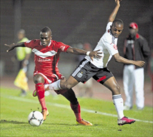 TWISTED: Luyolo Nomandela of Free State Stars battles with Patrick Phungwayo of Orlando Pirates during their Absa Premiership match at Charles Mopeli Stadium last night. PHOTO: BackpagePix