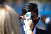 Students are screened for Covid-19 Symptoms, 24 August 2020, at Alberton High School, South of Johannesburg. Schools have opened to all grades for the first time since the national lockdown. 