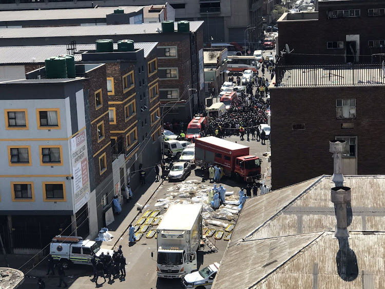 An aerial view of the scene at Delvers Street in the Johannesburg CBD after a deadly fire on Thursday. The Gauteng health department said the 74 bodies will be available for viewing by relatives at the Diepkloof mortuary from Friday.