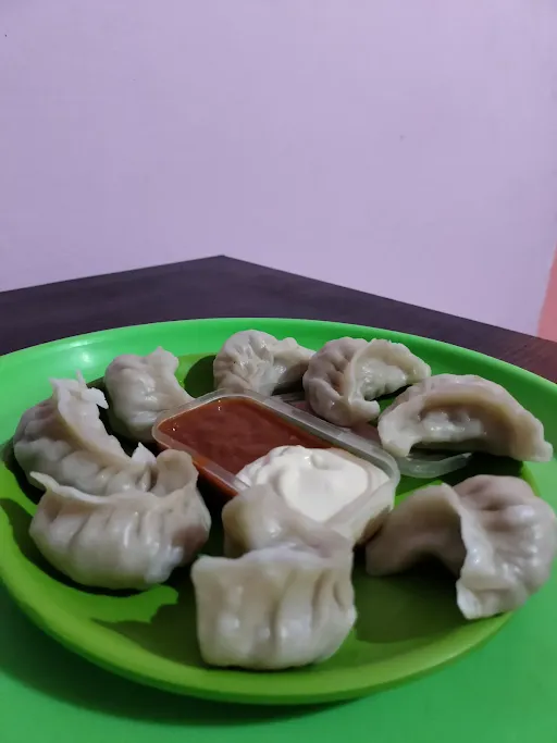 Chicken Steamed Momos [8 Pieces]