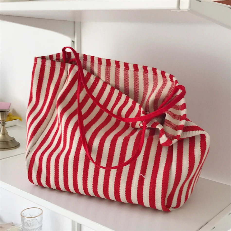 Damen Vintage Streifen Canvas Tasche einfach und stilvoll. Geräumig, leicht und perfekt für den Alltag, Einkaufen oder als schicke Freizeittasche.