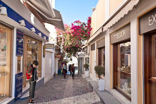 Modern boutique shops line the main visitors' walkway in Fira, capital of Santorini. 