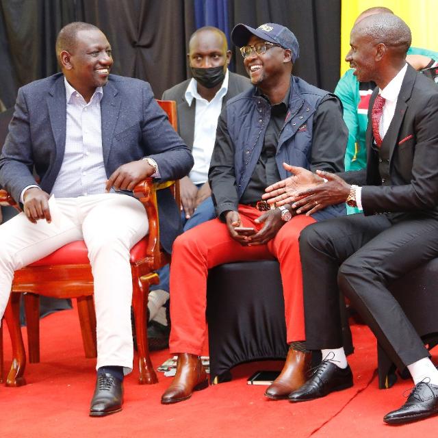 UDA presidential candidate William Ruto, Edward Muriu and Wilson Sossion share a light moment at a past event.