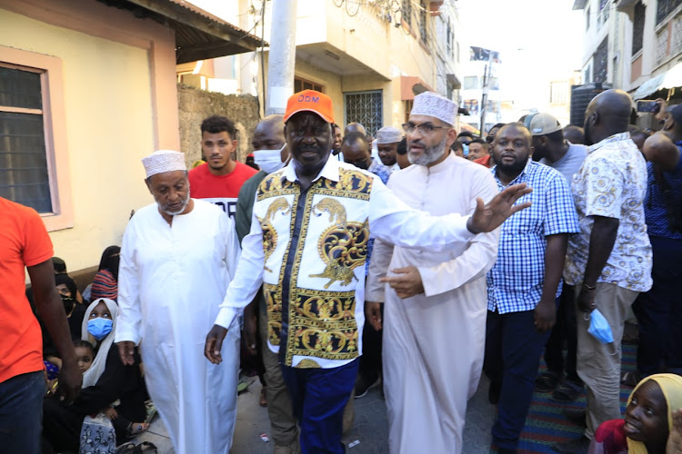 Raila Odinga and Mvta MP Abdulswamad Nassir at Floringi in Mvita on Monday.