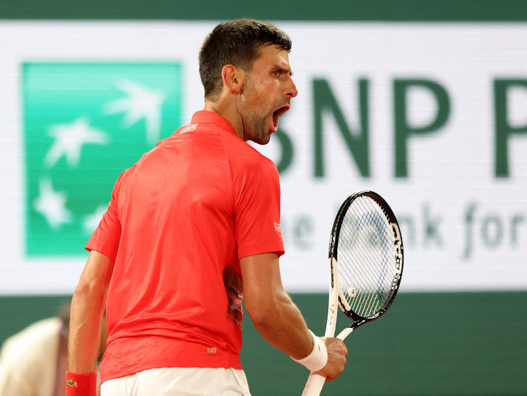 Serbia's Novak Djokovic reacts during his first round match against Japan's Yoshihito Nishioka