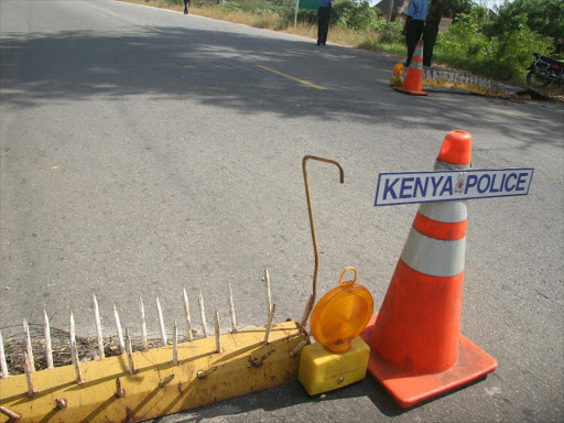 A police roadblock in one of the country's highways. /FILE