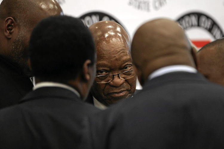 Former president Jacob Zuma talks to his legal counsel at the Zondo commission of inquiry into state capture in Parktown, Johannesburg, last week.