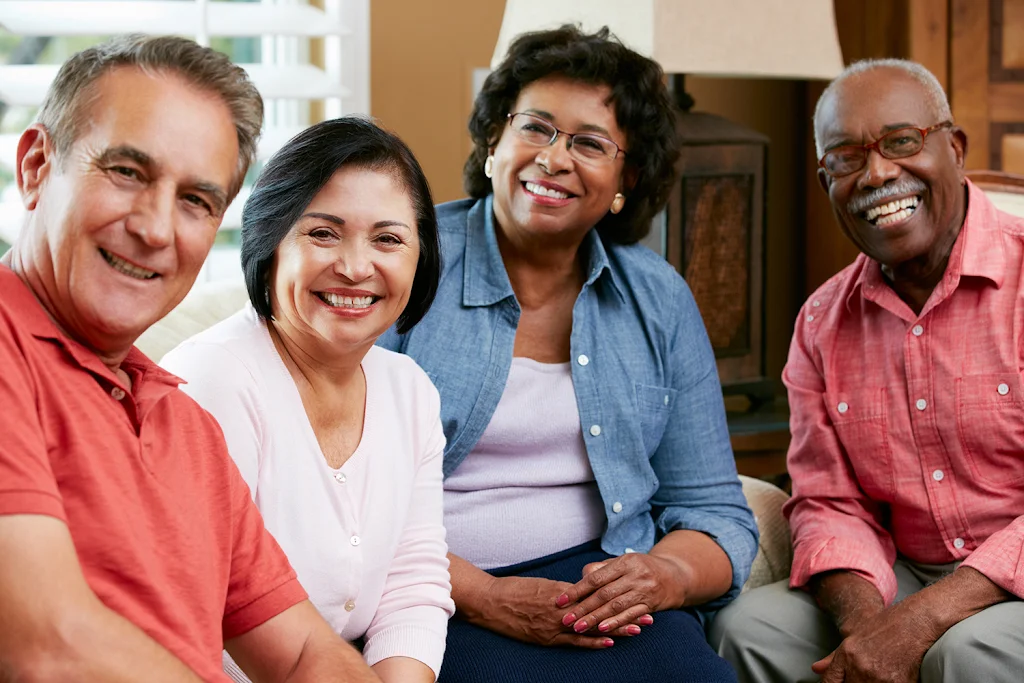 Group of four seniors hanging out together