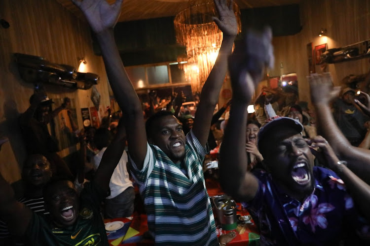 South Africans at Xai Xai Lounge in Melville, Johannesburg celebrate after the final whistle was blown and the Springboks won the 2023 World Cup final against the All Blacks in Paris on Saturday night.